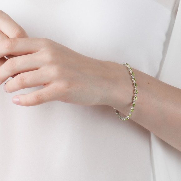 14K. SOLID GOLD TENNIS BRACELET WITH PERIDOTS - Picture 3 of 5